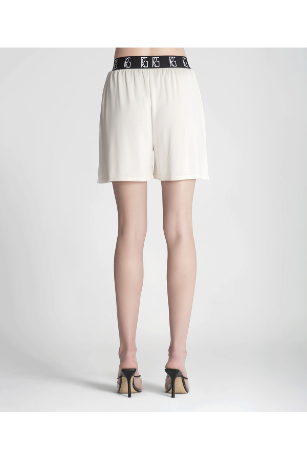 Pantalon Iniciales. Inicio. Color: blanco roto, negro; Tallas: talla unica |