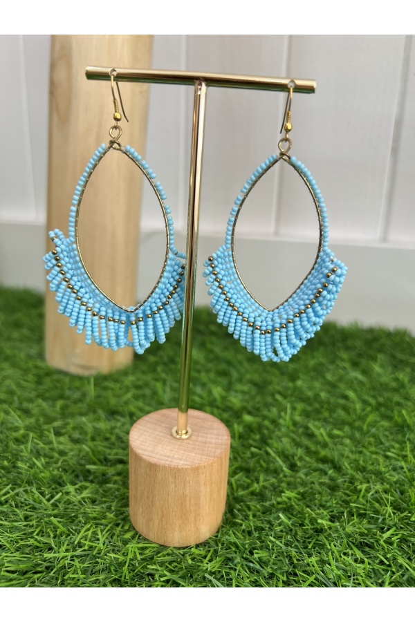 Vestidos Polinesia Azul. Bisuteria.  | Bambalinas Closet