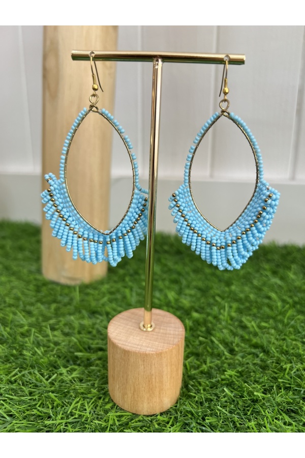 Vestidos Polinesia Azul. Bisuteria.  | Bambalinas Closet