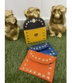 Monedero Tachas. Varios. Color: amarillo, naranja, azul klein | Bambalinas Closet