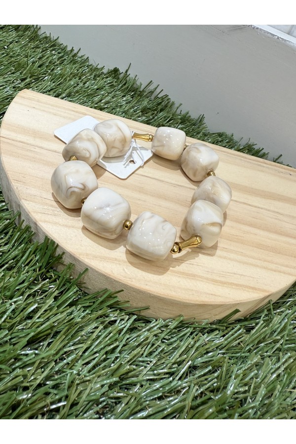 Pulsera Dado. Bisuteria. Color: marron chocolate, burdeos, multicolor, marfil |