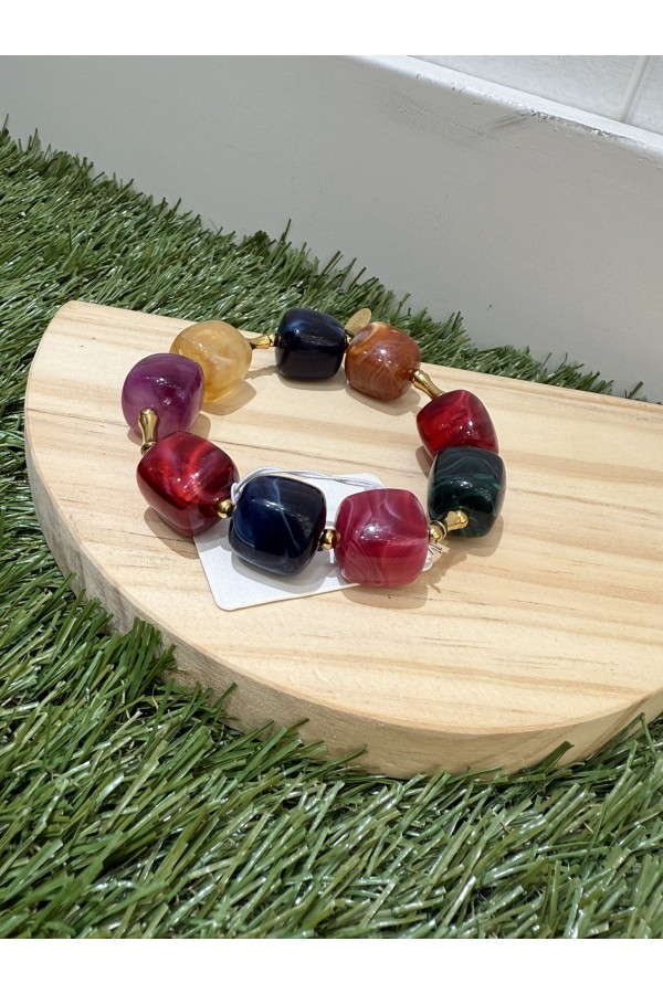 Pulsera Dado. Bisuteria. Color: marron chocolate, burdeos, multicolor, marfil |