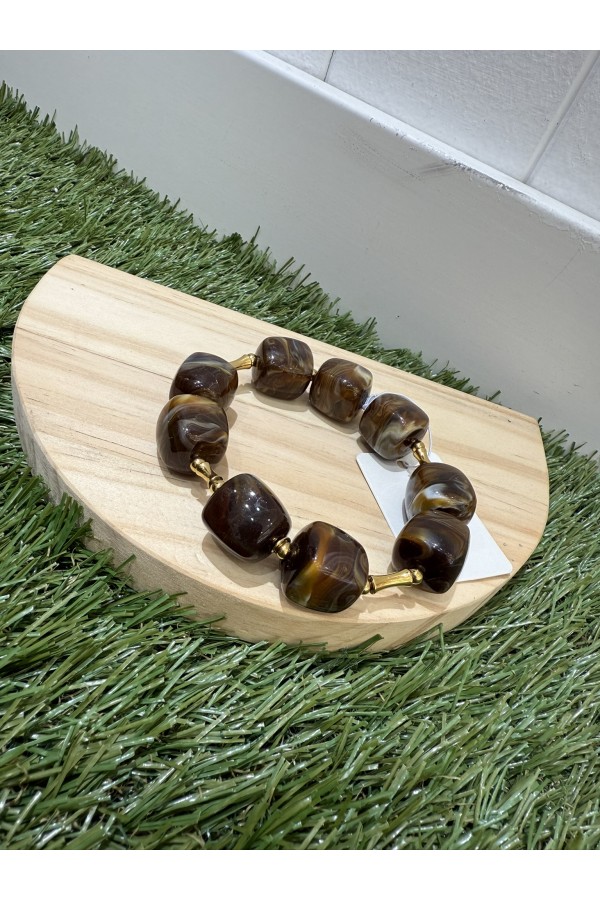 Pulsera Dado. Bisuteria. Color: marron chocolate, burdeos, multicolor, marfil |