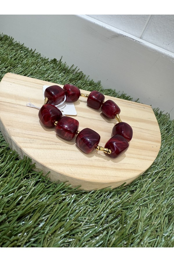 Pulsera Dado. Bisuteria. Color: marron chocolate, burdeos, multicolor, marfil |