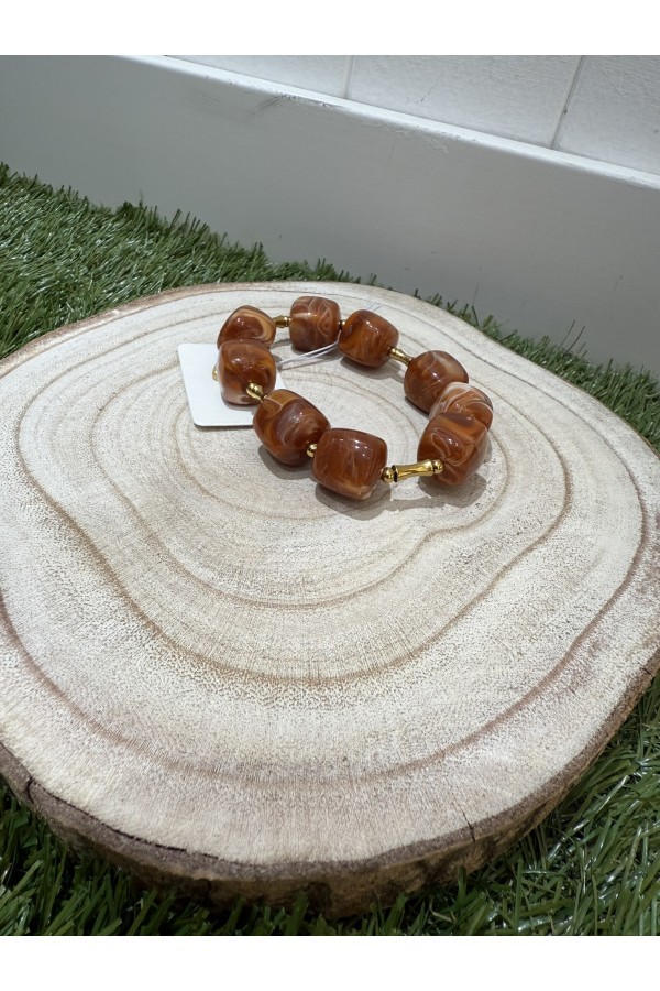 Pulsera Dado. Bisuteria. Color: marfil, marron chocolate, burdeos, multicolor